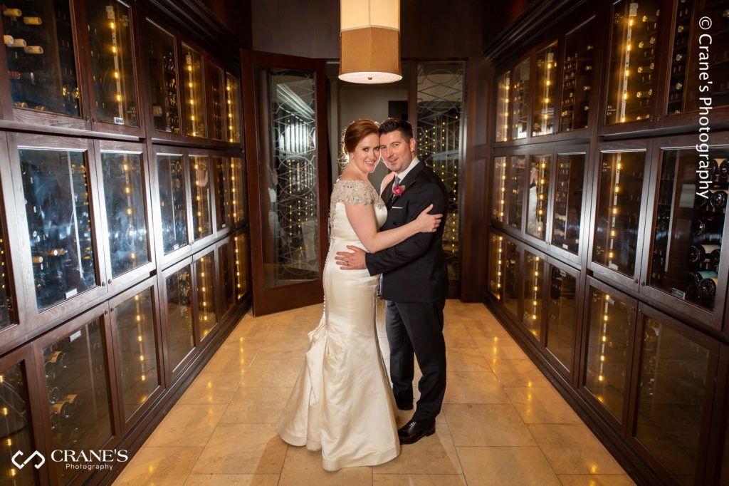 Bride and groom photo at the wine room at Mid-America Club at AON Center in Chicago, IL