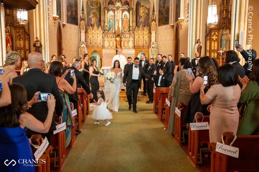 Bride and groom send-off at St. Joseph's church in Chicago