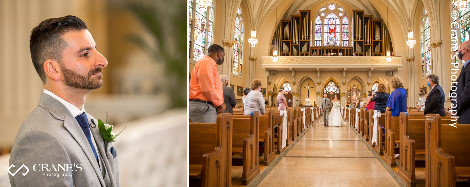 Bride and groom's first look moment during their wedding ceremony at St. Peter and Paul Church in Naperville
