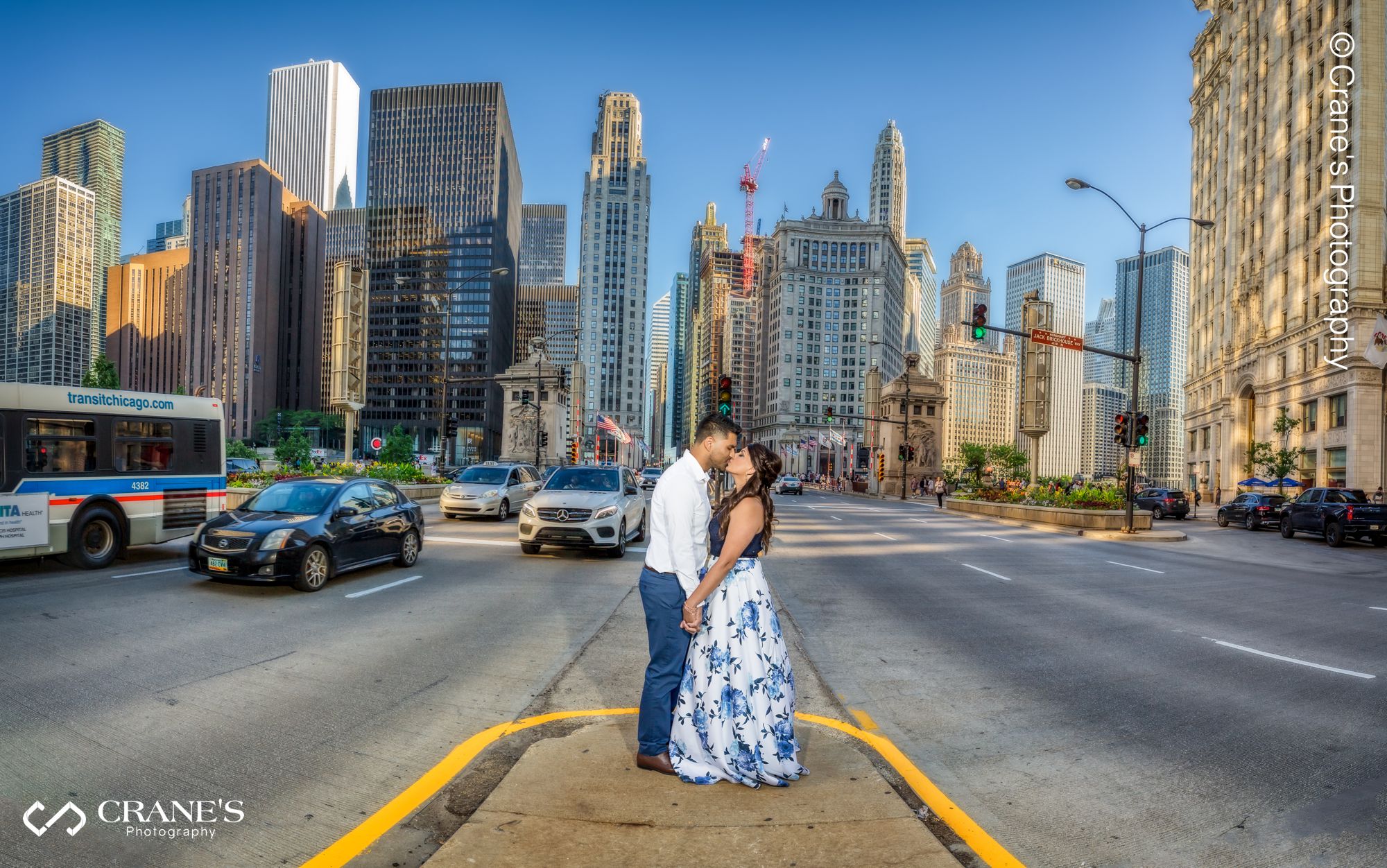 A panoramic view of downtown Chicago engagement photo taken on Michigan Avenue