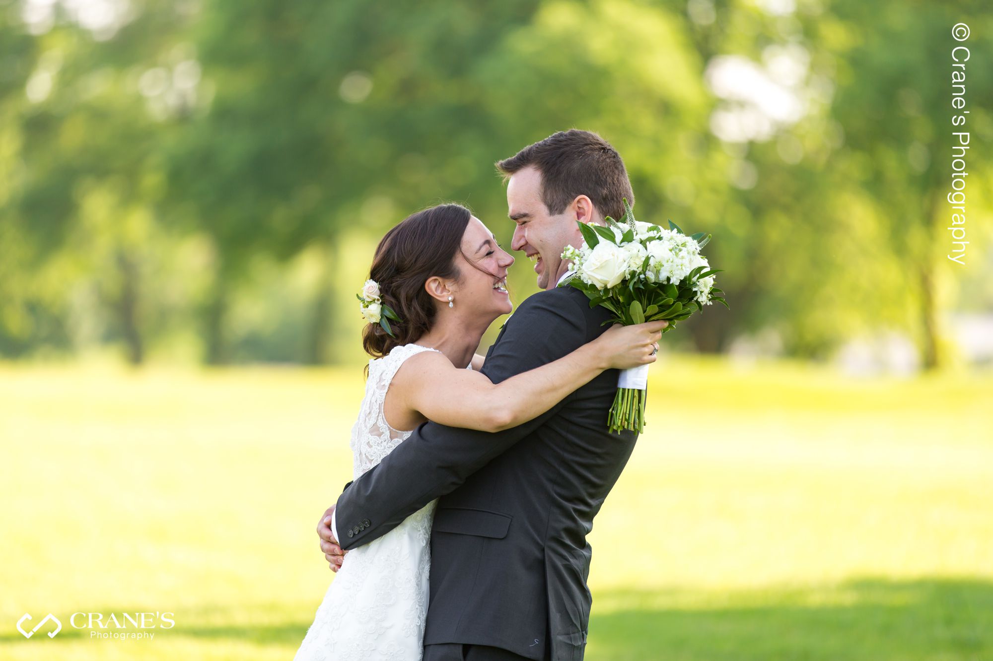 Candid bride and groom moment during their La Grange Country Club wedding