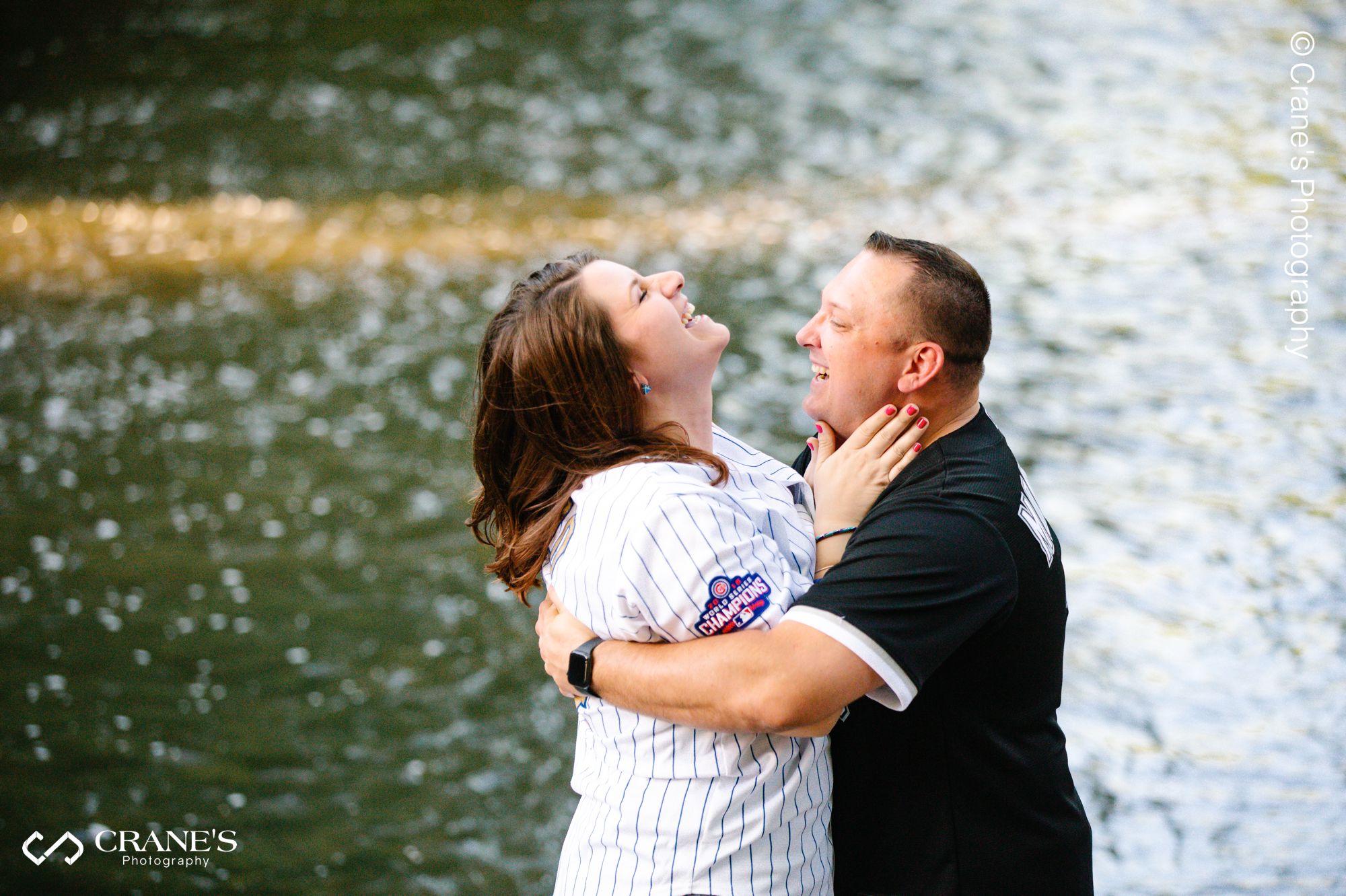 A candid image of an engaged couple at Naperville Riverwalk