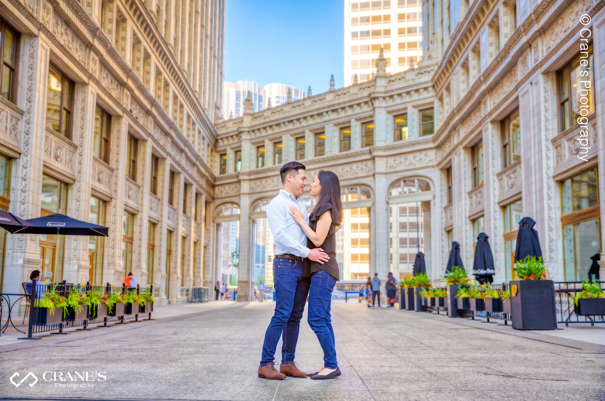 An engagement session at Wrigley building with the skywalk in the background