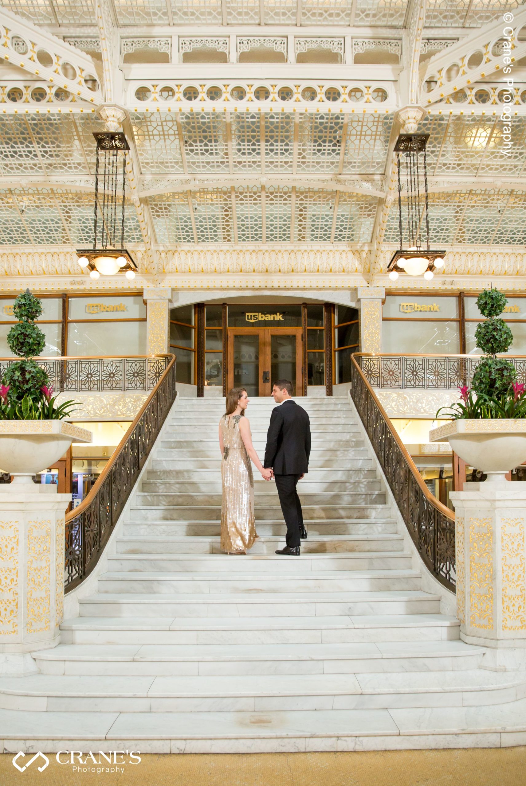 The grand staircase at The Rookery Chicago Engagement Photo