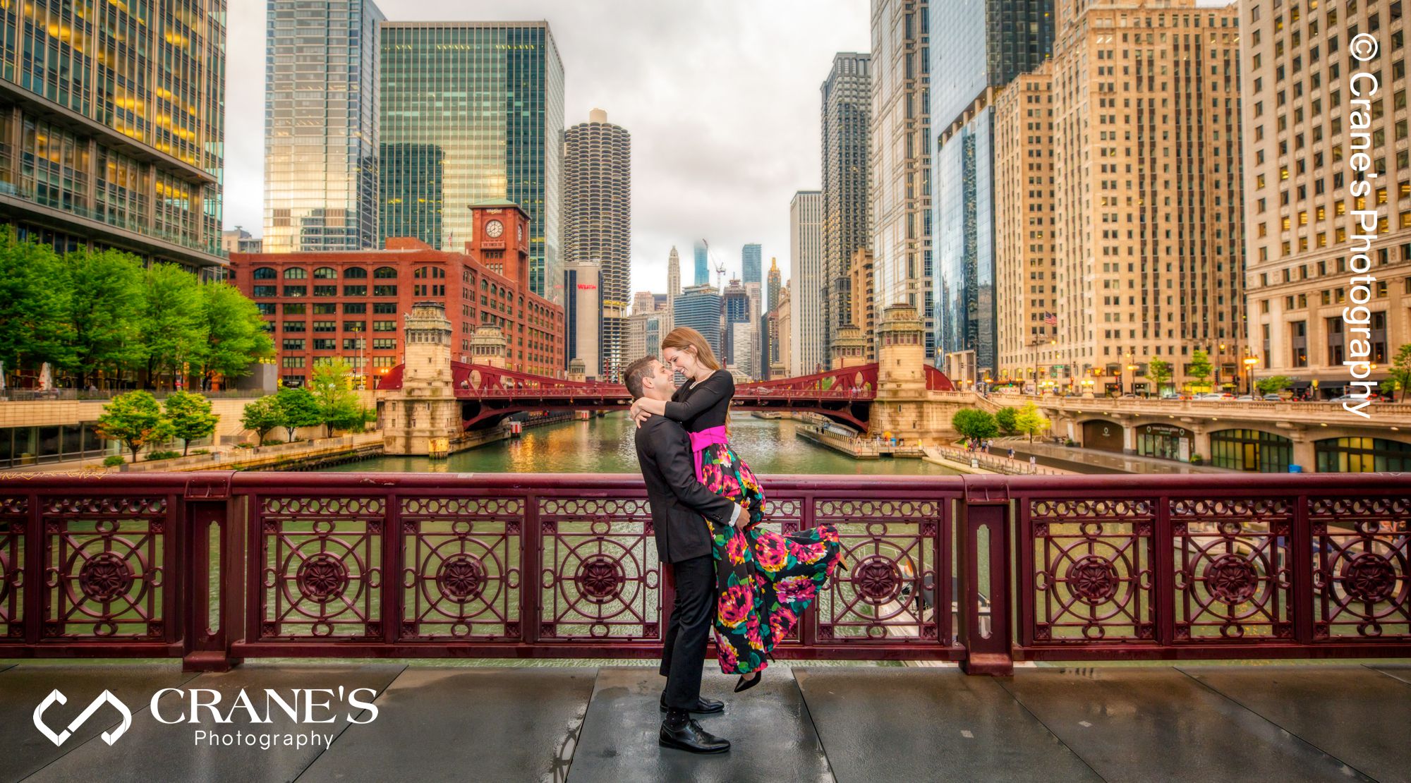 Stunning engagement photo taken on bridge with the Chicago skyline in the background.