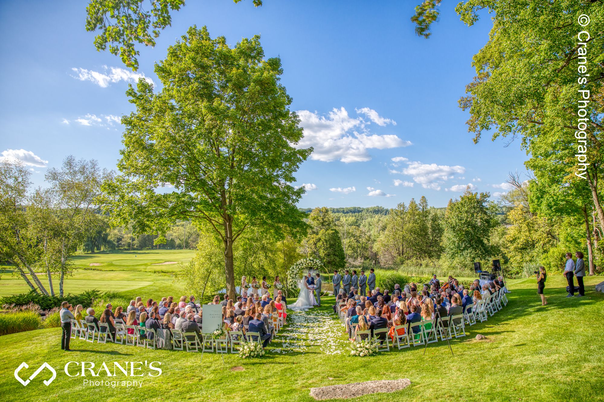 An outdoor wedding ceremony at Big Foot Country Club in Fontana-On-Geneva Lake
