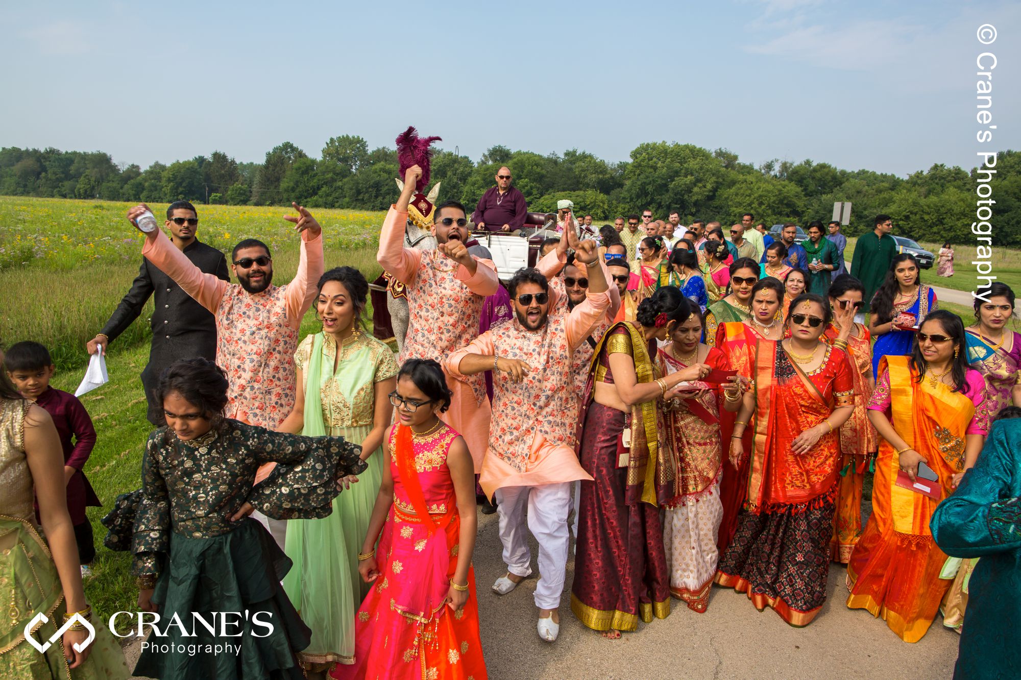 An Indian groom arriving on a horse for his outdoor wedding in Chicago