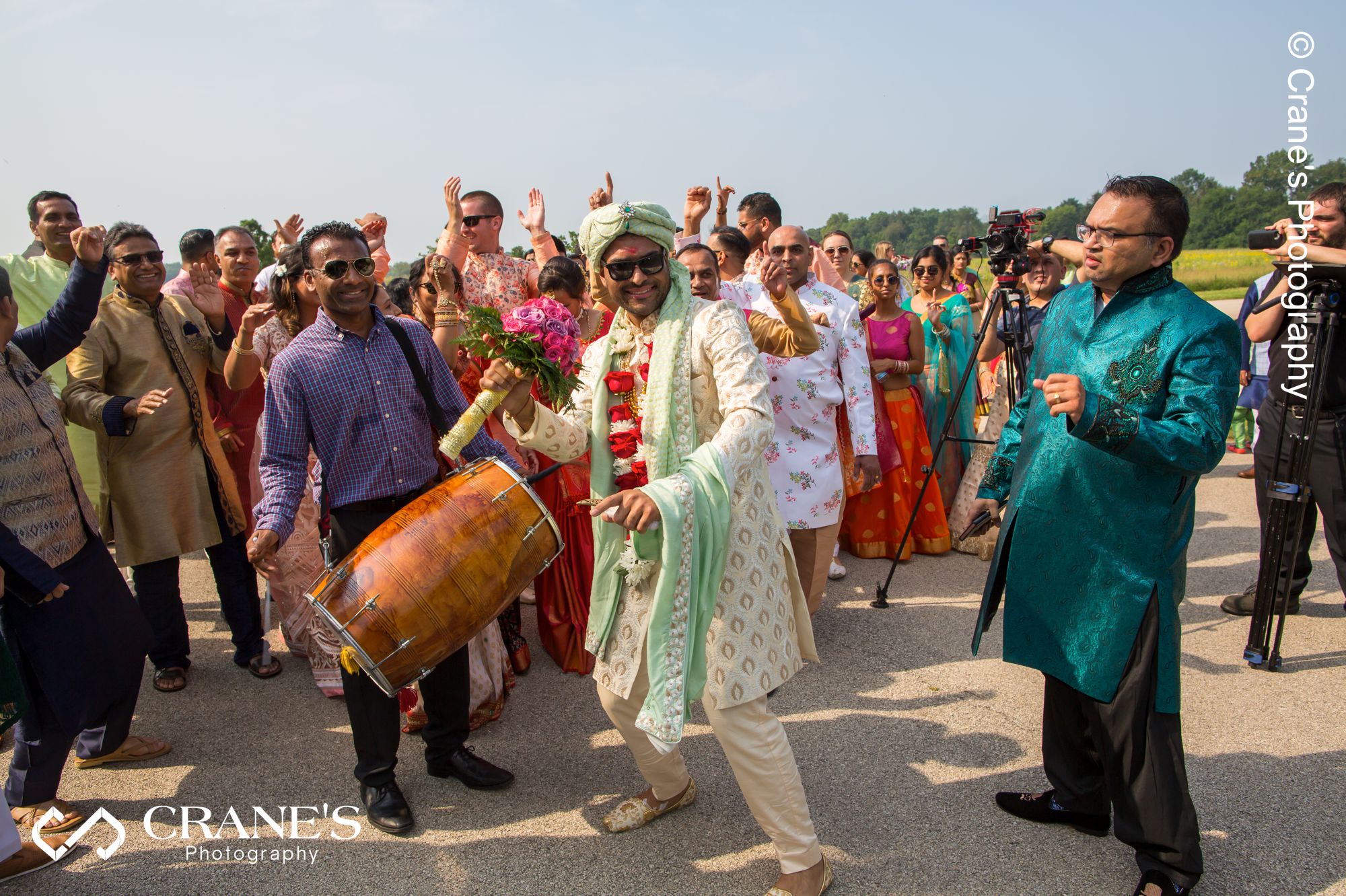 The groom dancing during his baraat on upbeat tempe