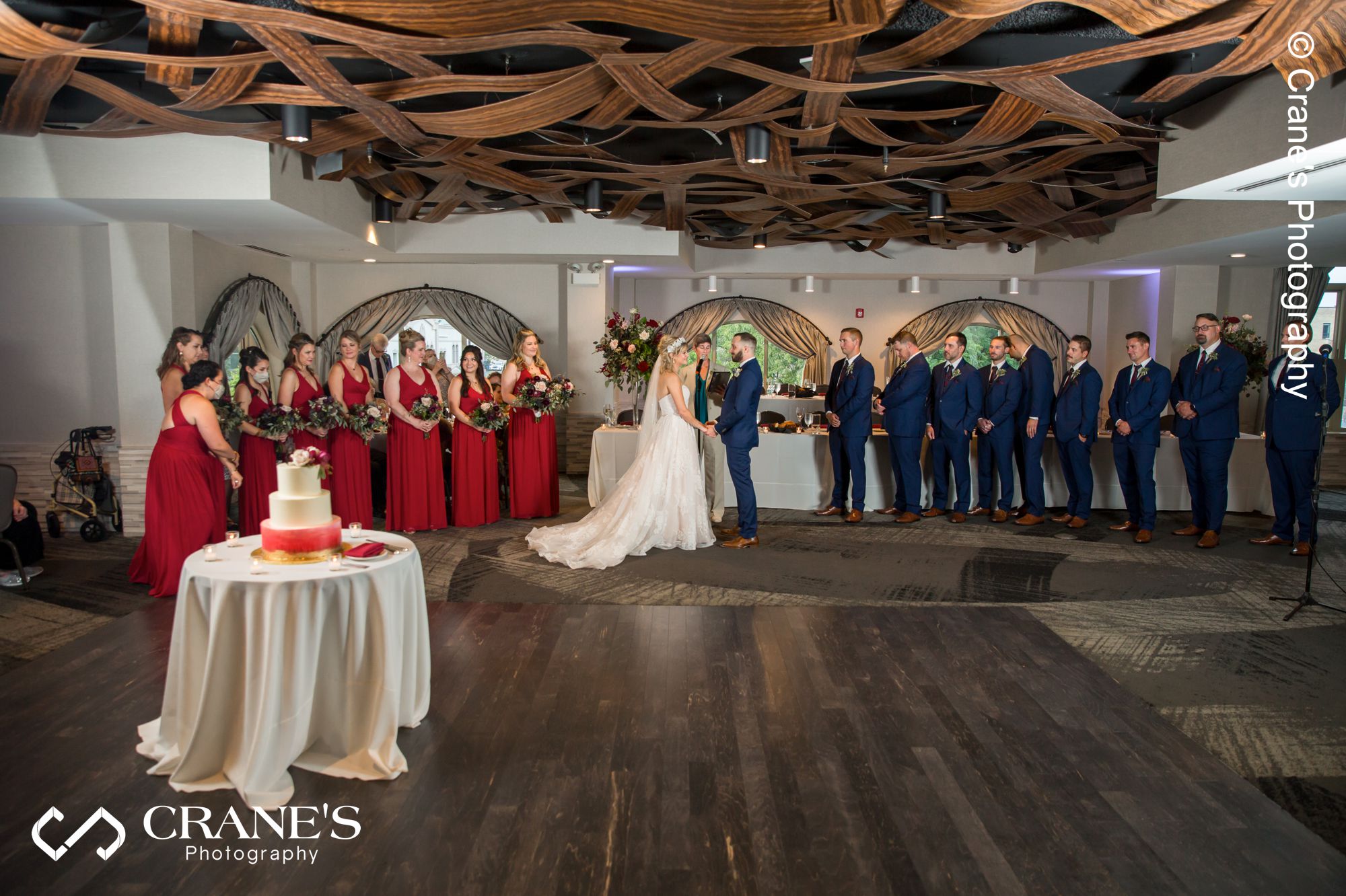 Wedding ceremony with large bridal party at the Elements at Water Street