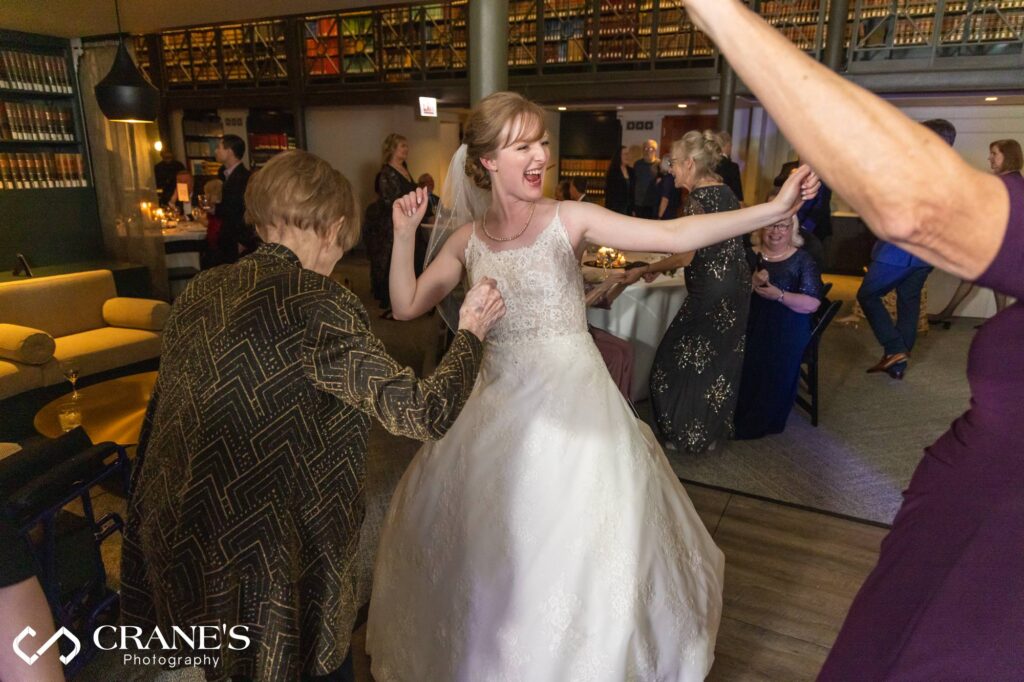 Bride dancing on the dance floor at The Library at 190 South LaSalle in Chicago.