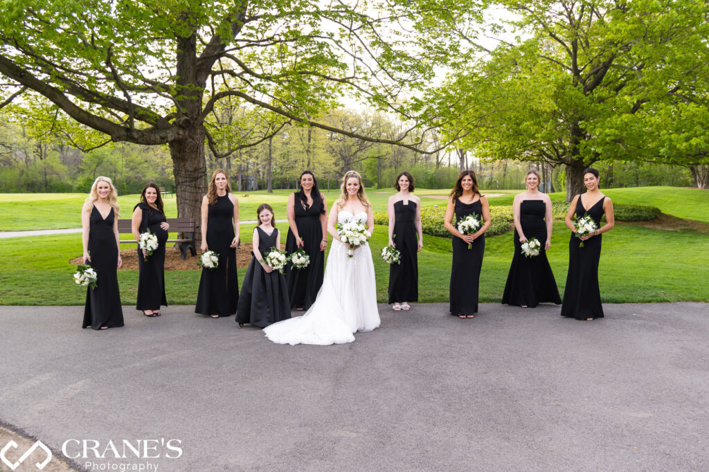 Bridesmaids pose for a wedding photo at Royal Melbourne Country Club.