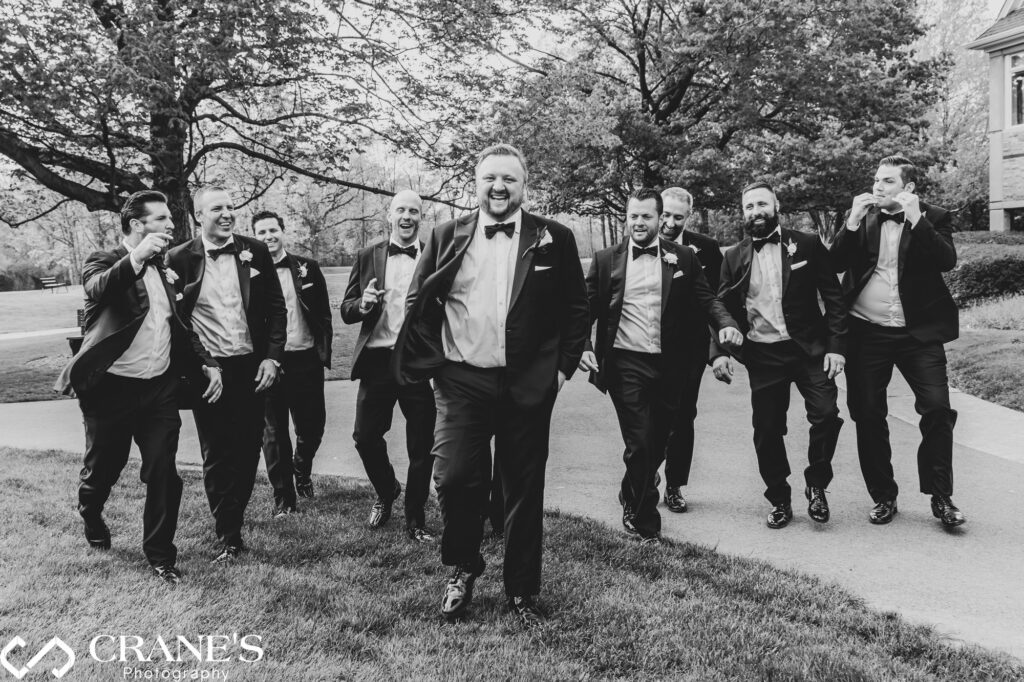 Groomsmen having fun on a wedding day at Royal Melbourne Country Club.