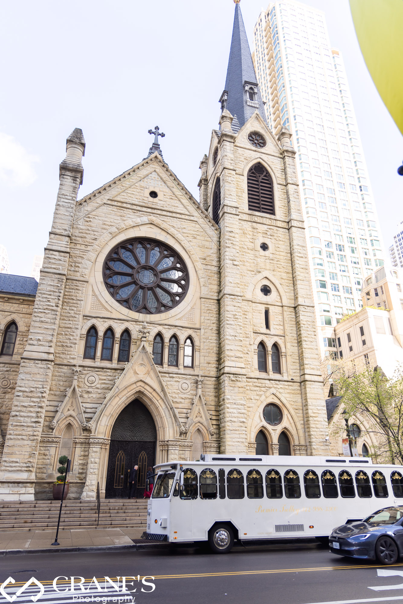 A trolley parked outside the Holy Name Cathedral on a wedding day