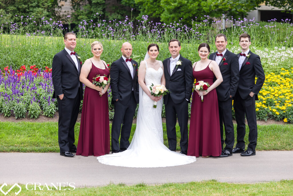 Wedding party photo wearing burgundy colors at Royal Melbourne.