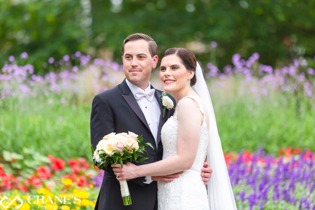 Wedding portrait with summer flowers outside Royal Melbourne in Long Grove.