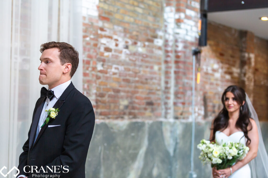 Bride and groom's "First Look" moment taken at Fairlie in Chicago