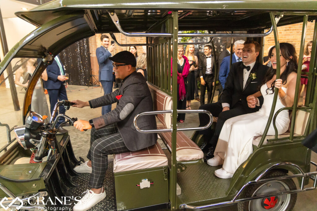 Emily and Ben's grand entrance on a rickshaw added a touch of whimsy on their wedding day and set the tone for a night of celebration at Fairlie.