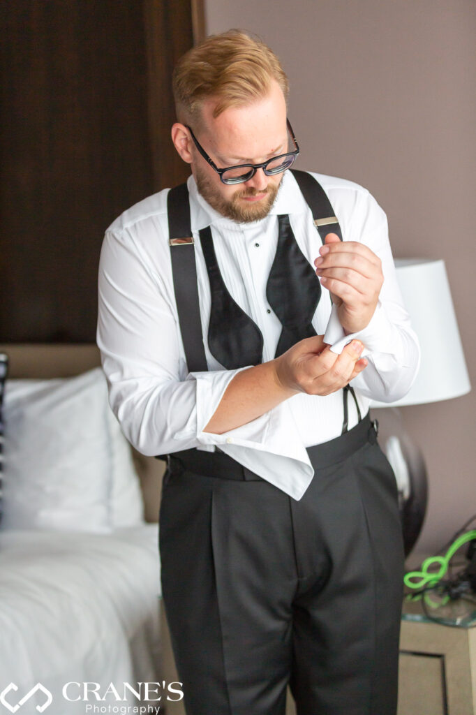 Groom getting ready for a black tie wedding at Trump Tower in Chicago
