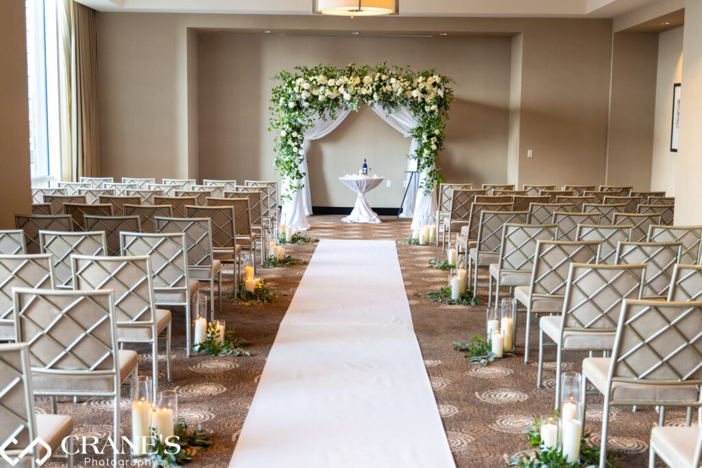 A magnificent Chuppah adorned with blooms at Trump tower jewish wedding.