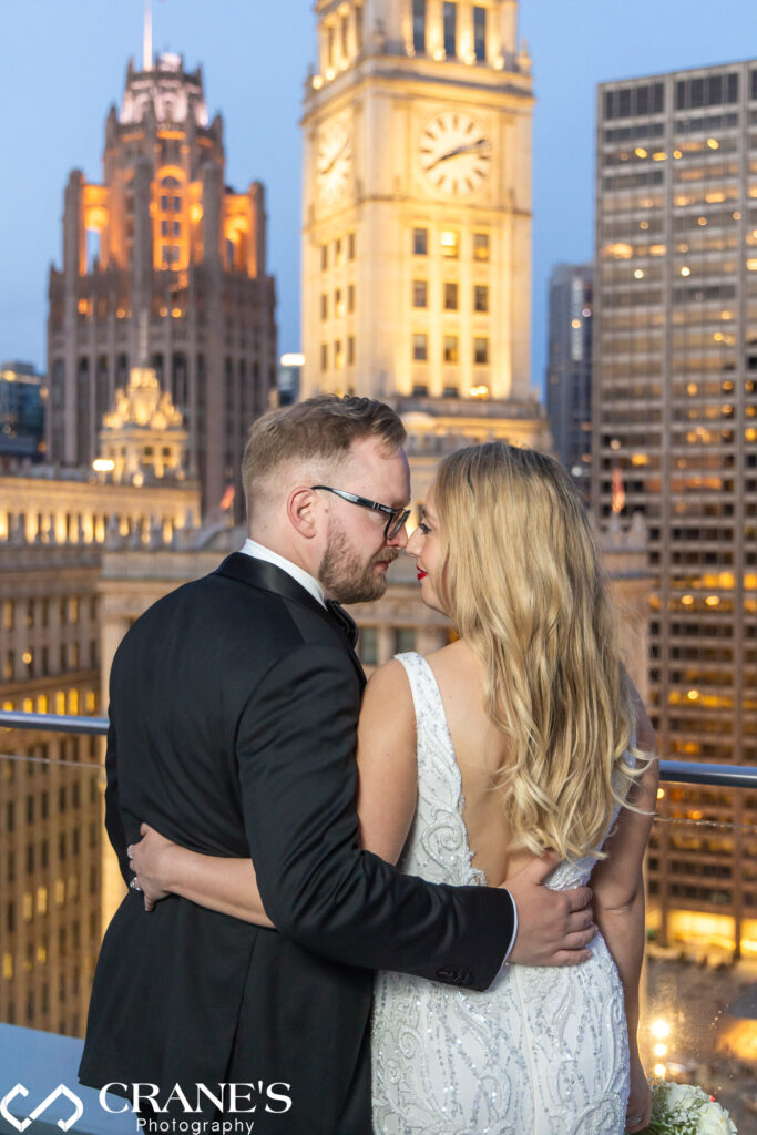 A wedding portrait at night taken on the Terrace on the 16th floor at Trump Tower in Chicago.