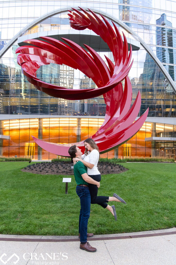 The constellation sculpture at the Chicago Riverwalk is one of the best area for an engagement session.
