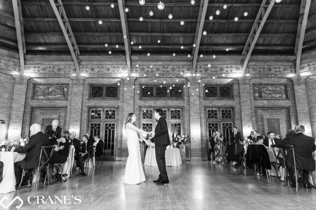 The first dance as a married couple at a luxurious wedding reception held at Cafe Brauer.