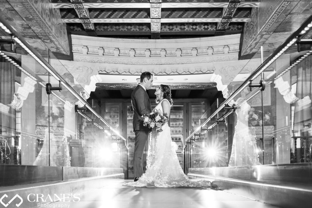 Wedding portrait of a couple at the InterContinental Hotel in Chicago, with the backdrop of Michael Jordan's wine cellar.