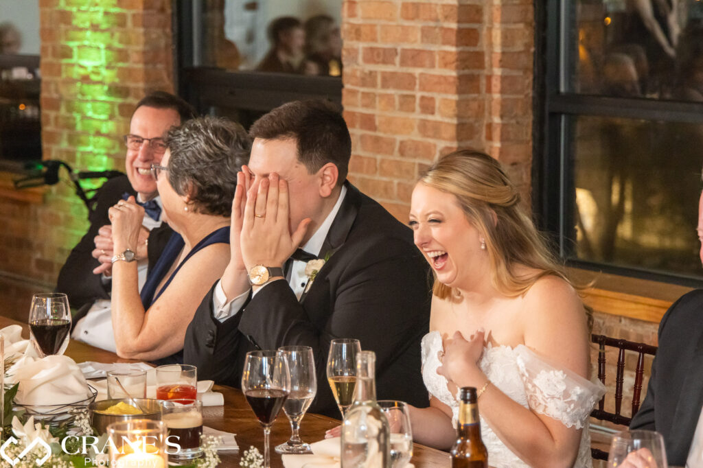At City View Loft, emotional speeches during the wedding reception create a heartfelt atmosphere, punctuated by laughter as the bride and groom share moments of joy and connection with their loved ones.