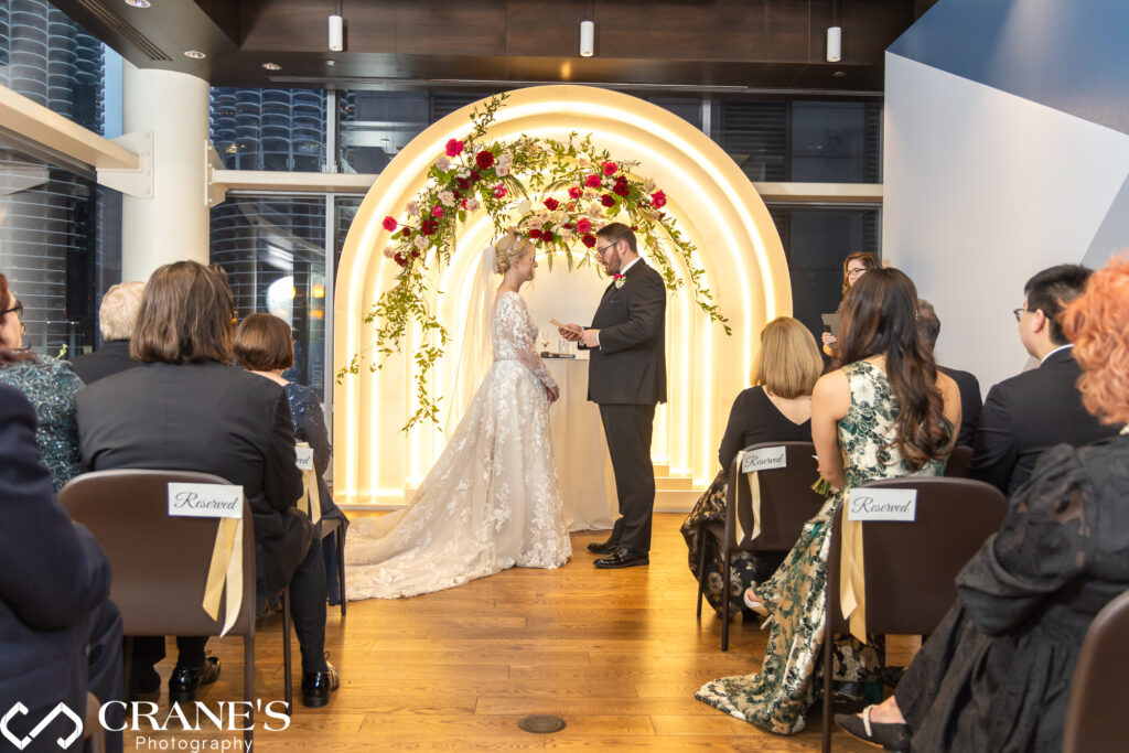 Wide-angle shot of the entire wedding ceremony at theWit, showcasing the Gateway Room's spaciousness and grandeur.