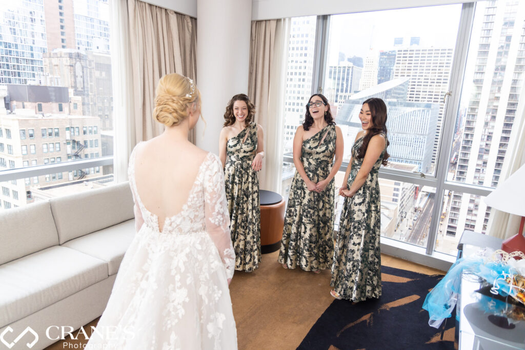 A captivating 'reveal moment' unfolds as the bride dons her wedding dress in anticipation of her ceremony at theWit, capturing the essence of a special and unforgettable pre-wedding scene.