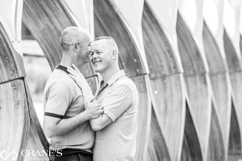 A happy gay couple, engaged to be married, pose for photos at the iconic honeycomb structure in Chicago's Lincoln Park. (LGBTQ+ Engagement)