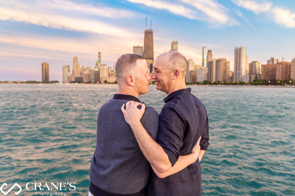 Chicago LGBTQ+ engagement session with a gay couple at North Ave Beach at sunset.