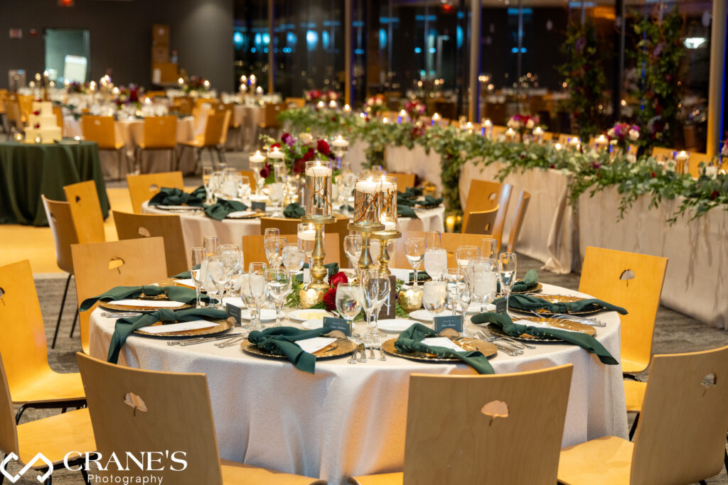 Elegant wedding ceremony setup in the Ginkgo Room at Morton Arboretum, featuring rows of chairs, soft floral arrangements, and fall-colored decor.